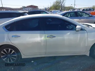 2017 Nissan Altima S with VIN 1N4AL3AP1HC220983, listed as a IAAI auction lot 42045858 with 114,753 mi miles and . Bid and sale history available at DreamBid. Image 12.