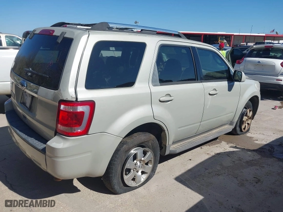 2009 Ford Escape Limited with VIN 1FMCU04709KA21968, listed as a IAAI auction lot 41769348 with 200,805 mi miles. Bid and sale history available at carsss.com. Image 4.