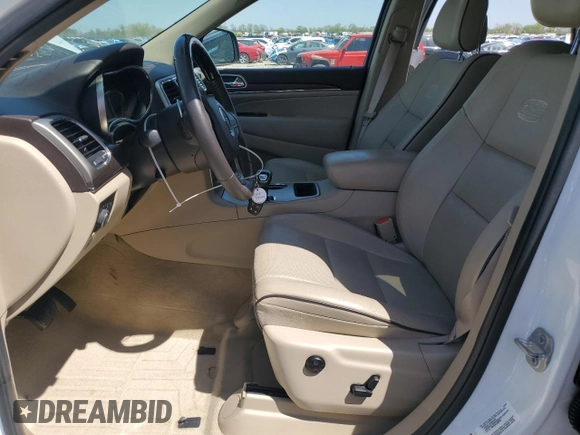 2014 Jeep Grand Cherokee Overland with VIN 1C4RJECG5EC519870, listed as a Copart auction lot 52364725 with 78,043 mi miles and Salvage Title. Bid and sale history available at carsss.com. Image 7.