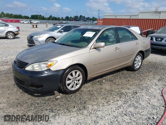 2004 Toyota Camry LE with VIN 4T1BF30K24U570599, listed as a IAAI auction lot 42107715 with 324,191 mi miles and . Bid and sale history available at DreamBid. Image 2.