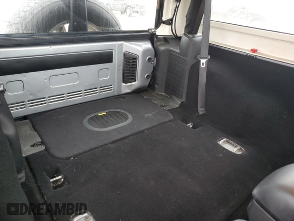 2015 Jeep Wrangler Sahara with VIN 1C4AJWBG8FL651169, listed as a Copart auction lot 44468995 with 119,419 mi miles and Salvage title. Bid and sale history available at DreamBid. Image 11.