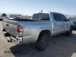 2018 Toyota Tacoma SR5 z VIN 3TMAZ5CN8JM077857, wystawiony jako Copart lot #52570945 z przebiegiem 50 182 mil mil oraz Szkoda całkowita • Salvage title. Historia ofert i sprzedaży dostępna na DreamBid. Obrazek 3.