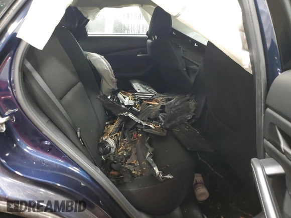 2023 Mazda CX-30 S with VIN 3MVDMBAM1PM565897, listed as a Copart auction lot 52426115 with 19,648 mi miles and Salvage title. Bid and sale history available at DreamBid. Image 10.