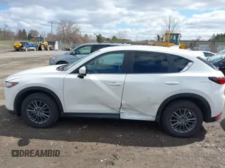 2019 Mazda CX-5 Touring with VIN JM3KFBCMXK0595905, listed as a IAAI auction lot 41934373 with 83,020 mi miles. Bid and sale history available at carsss.com. Image 14.