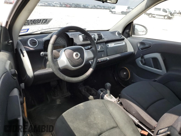 2015 Smart fortwo Passion z VIN WMEEJ3BA1FK793625, wystawiony jako Copart lot #47408555 z przebiegiem 66 795 mil mil oraz Szkody całkowita. Historia ofert i sprzedaży dostępna na DreamBid. Obrazek 8.