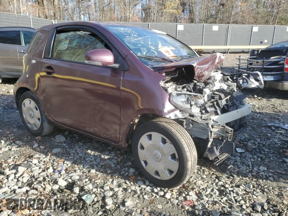 2013 Scion iQ with VIN JTNJJXB00DJ022017, listed as a Copart auction lot 82717994 with Not provided miles and Salvage title. Bid and sale history available at DreamBid. Image 4.