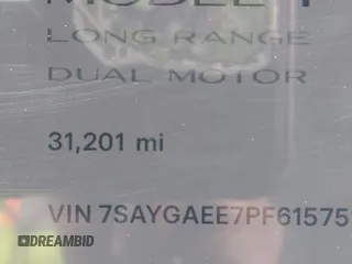 2023 Tesla Model Y Long Range with VIN 7SAYGAEE7PF615751, listed as a IAAI auction lot 42297819 with 31,201 mi miles and . Bid and sale history available at DreamBid. Image 16.