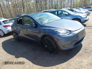 2022 Tesla Model Y Long Range z VIN 7SAYGAEE9NF574634, wystawiony jako IAAI lot #42040719 z przebiegiem 29 675 mil mil oraz . Historia ofert i sprzedaży dostępna na DreamBid. Obrazek 1.