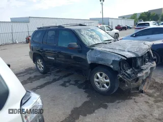 2002 GMC Envoy SLT with VIN 1GKDS13S522214475, listed as a IAAI auction lot 40580711 with 1 mi miles. Bid and sale history available at carsss.com. Image 1.