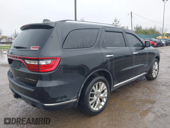 2014 Dodge Durango Citadel with VIN 1C4RDJEG5EC466164, listed as a IAAI auction lot 40936279 with 259,102 mi miles and . Bid and sale history available at DreamBid. Image 4.