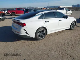 2022 Kia K5 GT-Line z VIN 5XXG64J23NG089623, wystawiony jako IAAI lot #42109751 z przebiegiem 128 273 mil mil oraz . Historia ofert i sprzedaży dostępna na DreamBid. Obrazek 4.