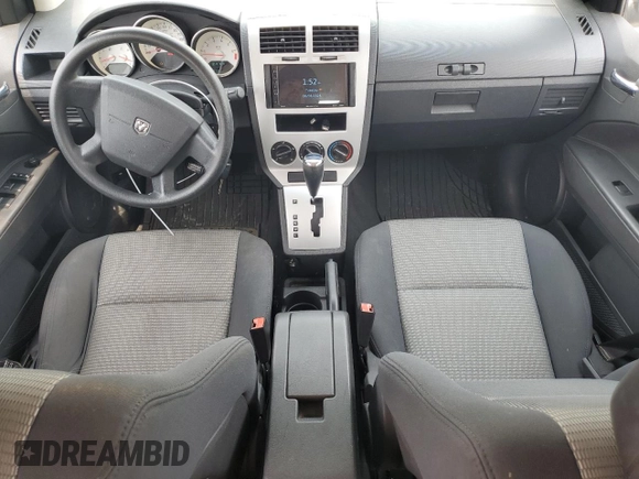 2009 Dodge Caliber SXT z VIN 1B3HB48A89D198108, wystawiony jako Copart lot #58910415 z przebiegiem 176 257 mil mil oraz Czysty tytuł • Clean title. Historia ofert i sprzedaży dostępna na DreamBid. Obrazek 8.