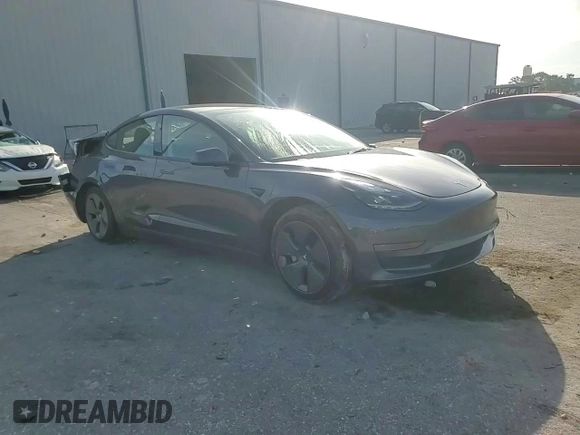 2023 Tesla Model 3 z VIN 5YJ3E1EA6PF621759, wystawiony jako Copart lot #63669045 z przebiegiem 20 094 mil mil oraz Szkoda całkowita • Salvage title. Historia ofert i sprzedaży dostępna na DreamBid. Obrazek 13.