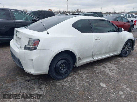 2014 Scion tC with VIN JTKJF5C73E3074035, listed as a IAAI auction lot 41426238 with 116,469 mi miles. Bid and sale history available at carsss.com. Image 4.