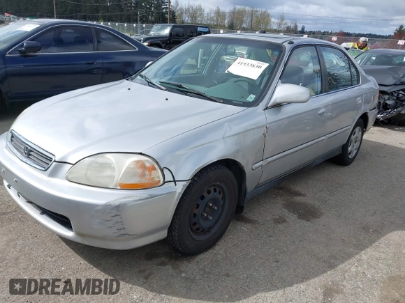 1998 Honda Civic EX with VIN 2HGEJ864XWH627385, listed as a IAAI auction lot 41933830 with 190,900 mi miles. Bid and sale history available at carsss.com. Image 2.