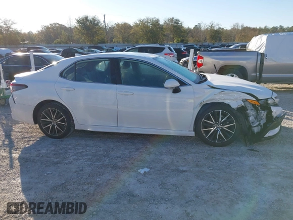 2023 Toyota Camry SE z VIN 4T1G11AKXPU153288, wystawiony jako IAAI lot #41816589 z przebiegiem 33 708 mil mil oraz . Historia ofert i sprzedaży dostępna na DreamBid. Obrazek 13.