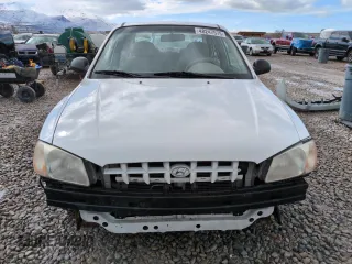 2002 Hyundai Accent GL with VIN KMHCG45C82U358523, listed as a Copart auction lot 48247575 with 164,869 mi miles and Salvage Title. Bid and sale history available at carsss.com. Image 5.