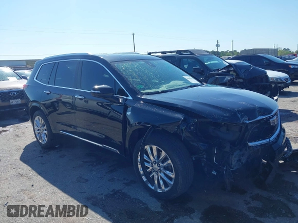 2020 Cadillac XT6 FWD Premium Luxury z VIN 1GYKPERS0LZ232338, wystawiony jako IAAI lot #41845562 z przebiegiem 86 839 mil mil oraz . Historia ofert i sprzedaży dostępna na DreamBid. Obrazek 1.