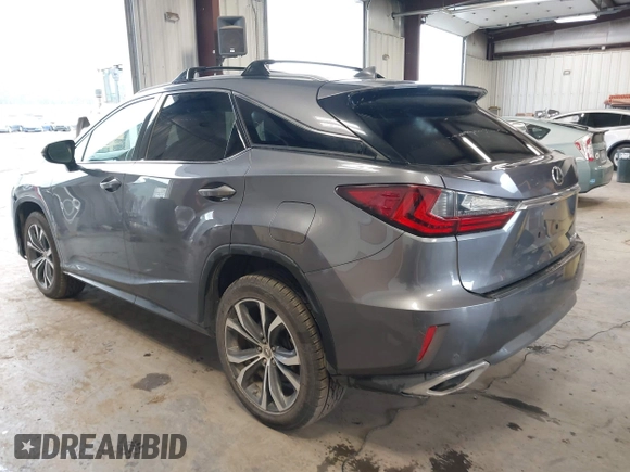 2016 Lexus RX 350 with VIN 2T2BZMCA3GC021804, listed as a IAAI auction lot 41830962 with 185,658 mi miles and . Bid and sale history available at DreamBid. Image 3.