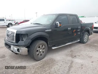 2012 Ford F-150 XL with VIN 1FTFW1CF4CKE17600, listed as a IAAI auction lot 42120211 with 202,613 mi miles. Bid and sale history available at carsss.com. Image 2.