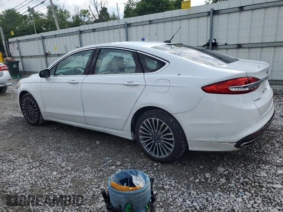 2017 Ford Fusion SE z VIN 3FA6P0H92HR203496, wystawiony jako Copart lot #56719365 z przebiegiem 99 817 mil mil oraz Szkoda całkowita • Salvage title. Historia ofert i sprzedaży dostępna na DreamBid. Obrazek 2.