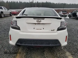 2014 Scion tC z VIN JTKJF5C78E3086696, wystawiony jako Copart lot #84040544 z przebiegiem 83 973 mil mil oraz Szkoda całkowita • Salvage title. Historia ofert i sprzedaży dostępna na DreamBid. Obrazek 6.