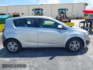 2014 Chevrolet Sonic LT with VIN 1G1JC6SH8E4216494, listed as a IAAI auction lot 41945905 with 160,002 mi miles. Bid and sale history available at carsss.com. Image 6.