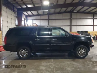 2007 GMC Yukon XL SLT with VIN 1GKFK16377R203165, listed as a IAAI auction lot 41622346 with 315,618 mi miles. Bid and sale history available at carsss.com. Image 14.