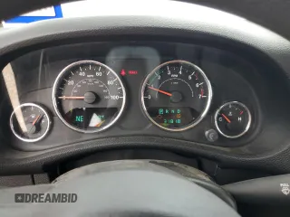 2012 Jeep Wrangler Unlimited Sport with VIN 1C4BJWDG5CL158739, listed as a Copart auction lot 51334975 with 31,818 mi miles and Salvage Title. Bid and sale history available at carsss.com. Image 9.