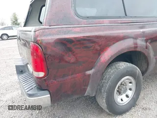2004 Ford Super Duty F-250 XL with VIN 1FTNW20L34EA70689, listed as a IAAI auction lot 41923744 with 437,297 mi miles. Bid and sale history available at carsss.com. Image 13.