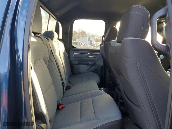2023 Ram 1500 Lone Star with VIN 1C6RREBT9PN553316, listed as a Copart auction lot 85867204 with 26,597 mi miles and Salvage Title. Bid and sale history available at carsss.com. Image 10.