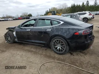 2017 Tesla Model S 100D with VIN 5YJSA1E21HF218273, listed as a Copart auction lot 55598075 with Not provided miles and Salvage title. Bid and sale history available at DreamBid. Image 2.