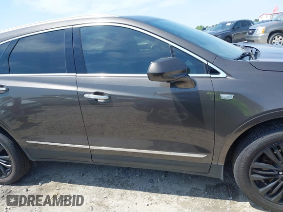 2019 Cadillac XT5 Luxury AWD z VIN 1GYKNDRS9KZ235687, wystawiony jako IAAI lot #41987360 z przebiegiem 78 784 mil mil oraz . Historia ofert i sprzedaży dostępna na DreamBid. Obrazek 14.