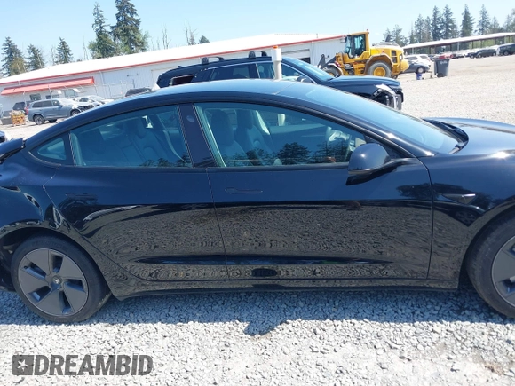 2022 Tesla Model 3 Long Range with VIN 5YJ3E1EB7NF241996, listed as a IAAI auction lot 42115915 with 23,433 mi miles and . Bid and sale history available at DreamBid. Image 13.