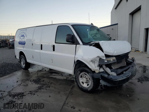 2021 Chevrolet Express Cargo with VIN 1GCWGBFP0M1206747, listed as a Copart auction lot 82701894 with Not provided miles and Salvage title. Bid and sale history available at DreamBid. Image 4.