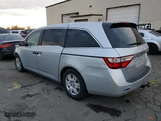 2013 Honda Odyssey LX with VIN 5FNRL5H2XDB065110, listed as a Copart auction lot 41387555 with 180,572 mi miles and Salvage Title. Bid and sale history available at carsss.com. Image 2.