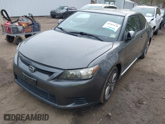2012 Scion tC with VIN JTKJF5C7XC3031406, listed as a IAAI auction lot 41947478 with 150,762 mi miles. Bid and sale history available at carsss.com. Image 2.