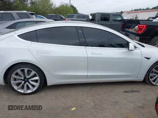 2020 Tesla Model 3 Long Range with VIN 5YJ3E1EB0LF703733, listed as a IAAI auction lot 41796732 with 75,027 mi miles. Bid and sale history available at carsss.com. Image 13.
