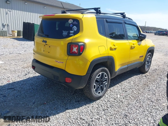 2015 Jeep Renegade Trailhawk with VIN ZACCJBCT0FPB69420, listed as a IAAI auction lot 41982518 with 133,375 mi miles and . Bid and sale history available at DreamBid. Image 4.
