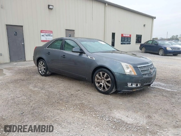 2008 Cadillac CTS RWD w/1SB with VIN 1G6DV57V180172215, listed as a IAAI auction lot 41910992 with 207,840 mi miles. Bid and sale history available at carsss.com. Image 1.