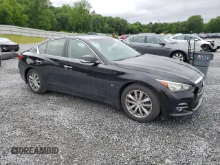 2015 Infiniti Q50 Premium z VIN JN1BV7AP0FM349503, wystawiony jako Copart lot #57766245 z przebiegiem 101 237 mil mil oraz Szkoda całkowita • Salvage title. Historia ofert i sprzedaży dostępna na DreamBid. Obrazek 4.