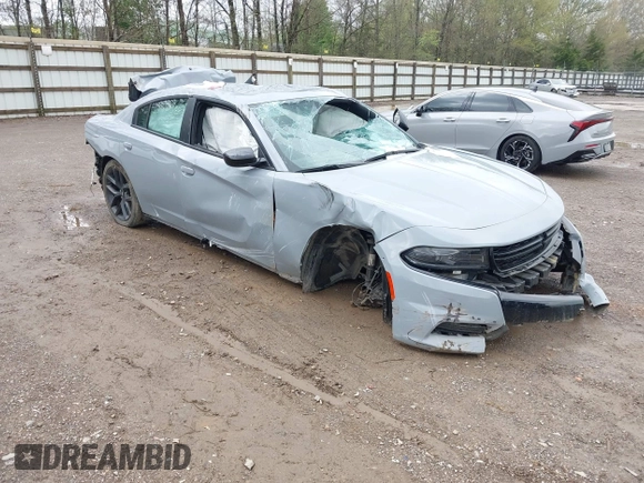 2022 Dodge Charger SXT with VIN 2C3CDXBGXNH145896, listed as a IAAI auction lot 42010378 with 24,561 mi miles and . Bid and sale history available at DreamBid. Image 1.