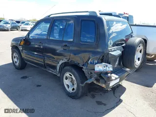 2001 Suzuki Grand Vitara JLX with VIN JS3TD62V414156342, listed as a IAAI auction lot 41762508 with 214,235 mi miles. Bid and sale history available at carsss.com. Image 3.