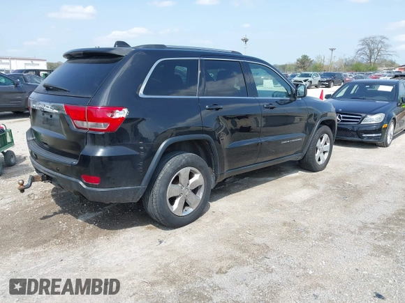 2014 Jeep Grand Cherokee Laredo with VIN 1C4RJFAG1EC315544, listed as a IAAI auction lot 42105987 with 164,430 mi miles. Bid and sale history available at carsss.com. Image 4.