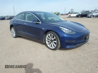 2018 Tesla Model 3 Long Range Battery z VIN 5YJ3E1EB7JF088224, wystawiony jako IAAI lot #42097665 z przebiegiem Nie podano mil oraz . Historia ofert i sprzedaży dostępna na DreamBid. Obrazek 1.