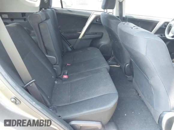 2014 Toyota RAV4 LE with VIN JTMZFREVXED034316, listed as a IAAI auction lot 42610135 with 214,871 mi miles and . Bid and sale history available at DreamBid. Image 8.