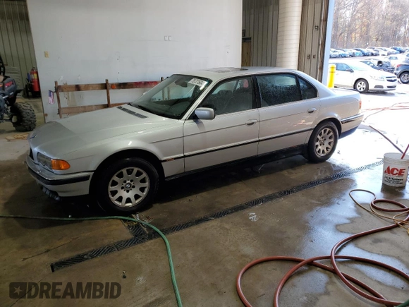 2000 BMW 7 Series 740iL with VIN WBAGH8341YDP13706, listed as a Copart auction lot 78727604 with 215,793 mi miles and Salvage Title. Bid and sale history available at carsss.com. Image 1.