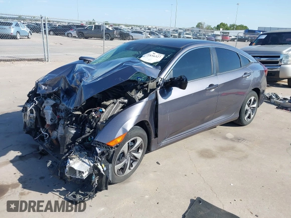 2020 Honda Civic LX z VIN 19XFC2F68LE023059, wystawiony jako IAAI lot #41856327 z przebiegiem 84 499 mil mil oraz . Historia ofert i sprzedaży dostępna na DreamBid. Obrazek 17.
