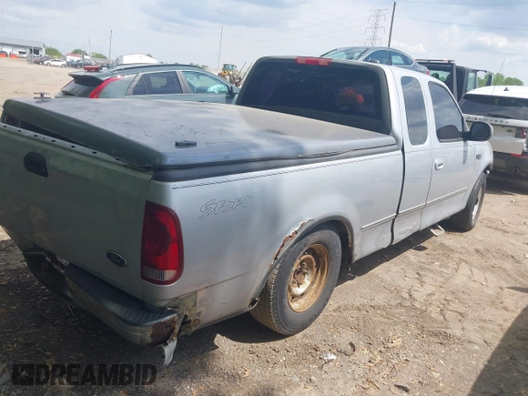 2001 Ford F-150 with VIN 2FTZX17221CB01390, listed as a IAAI auction lot 42194407 with 239,834 mi miles and . Bid and sale history available at DreamBid. Image 4.