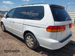 2003 Honda Odyssey EX-L with VIN 5FNRL18983B122294, listed as a IAAI auction lot 41922671 with 215,911 mi miles and . Bid and sale history available at DreamBid. Image 3.